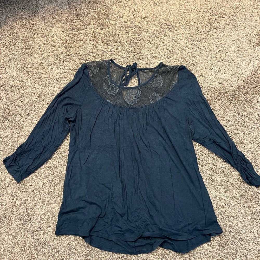 Maurices 3/4 sleeve with lace neck and tie in back.